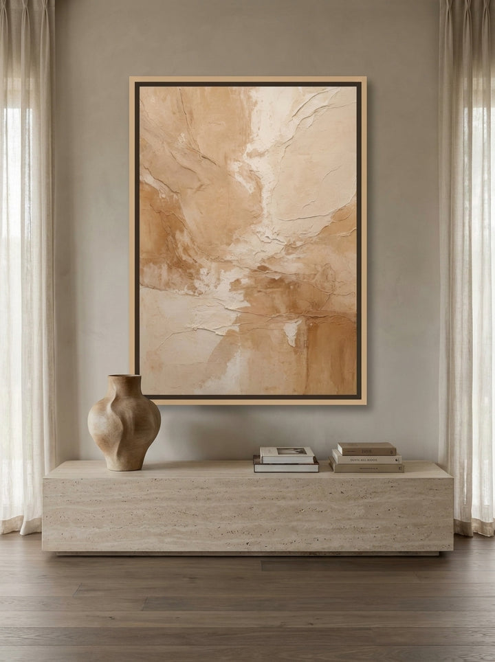 Oversized statement canvas wall art with a natural timber surround styled on the wall in a luxe living room