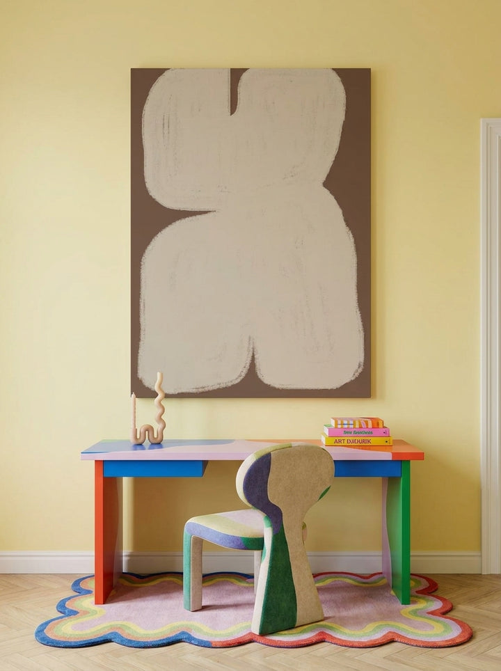 Stretched canvas wall art styled on the wall in a colourful eclectic home office