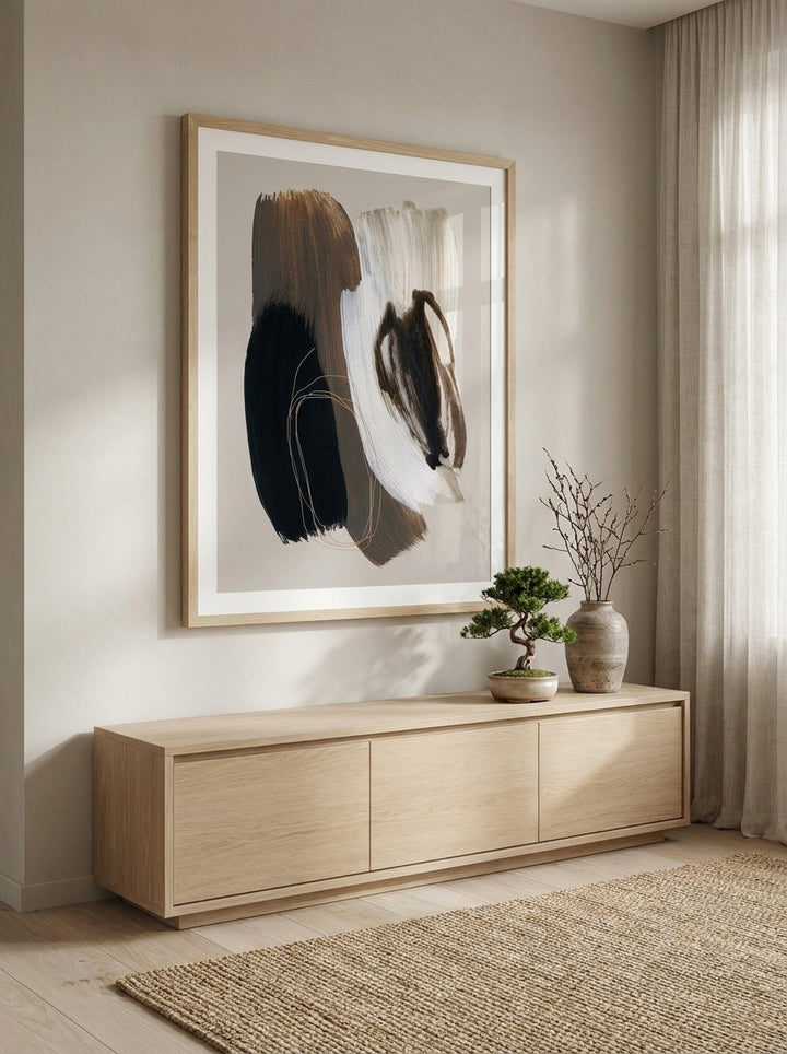 Modern wall art print styled on the wall in a warm Japandi living room