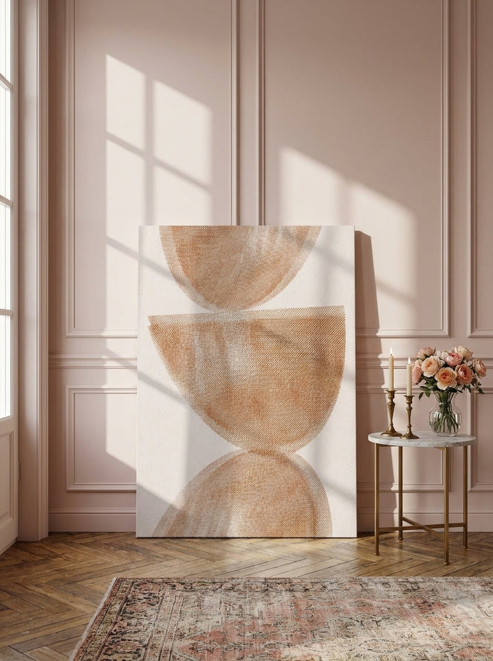 Stretched canvas wall art leaning against the wall in a Parisian home office