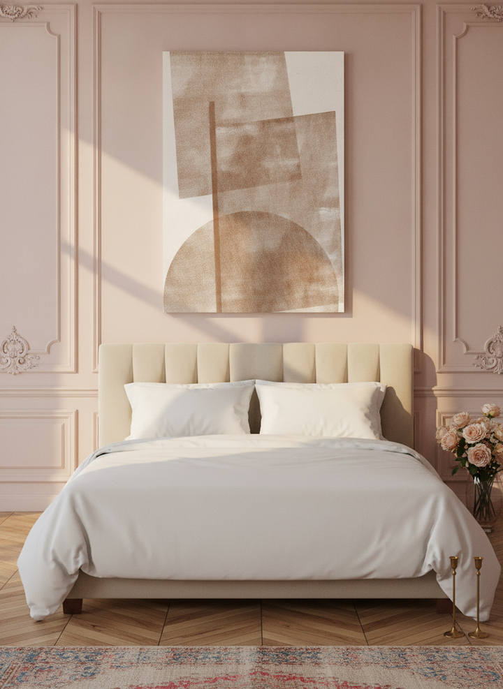 Stretched canvas wall art styled on the wall in a Parisian bedroom