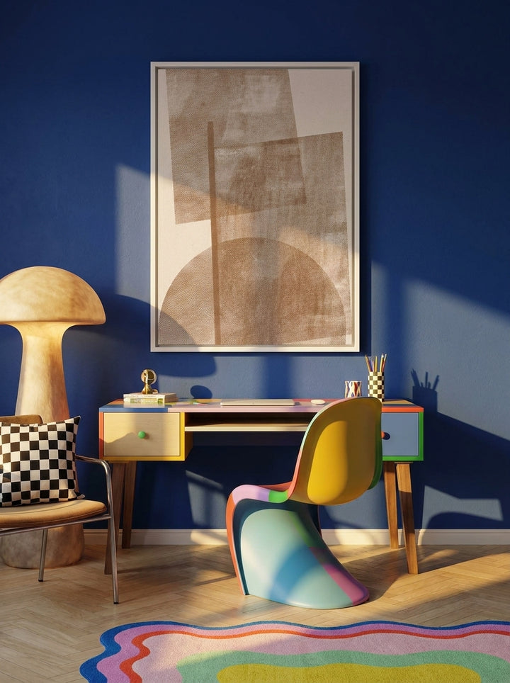 Canvas wall art with a white surround styled on the wall in a colourful eclectic home office