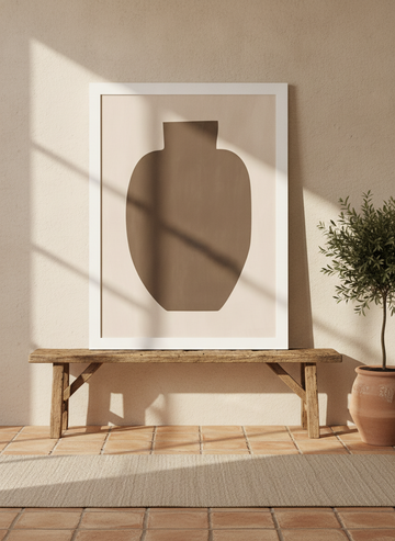 Modern wall art print standing on a bench in a Mediterranean home office