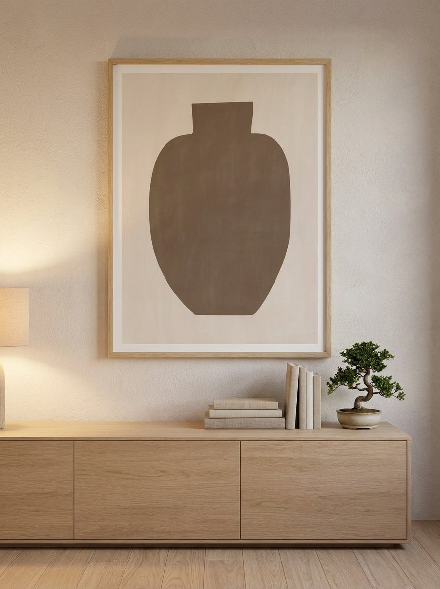 Modern wall art print styled on the wall in a warm Japandi living room