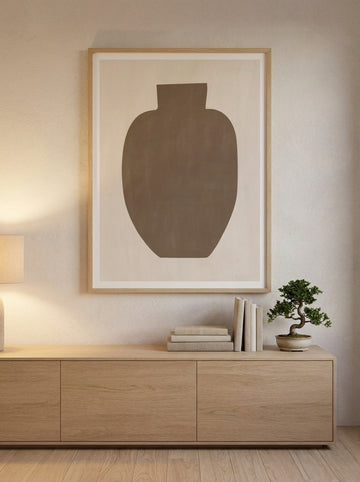 Modern wall art print styled on the wall in a warm Japandi living room