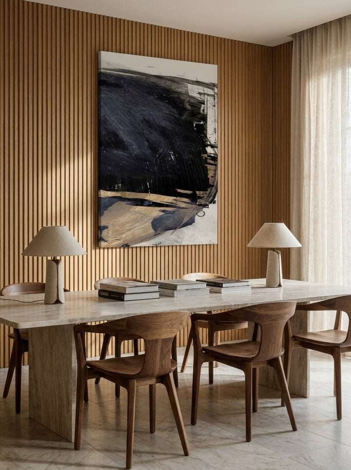Stretched canvas wall art styled on the wall in a luxe dining room
