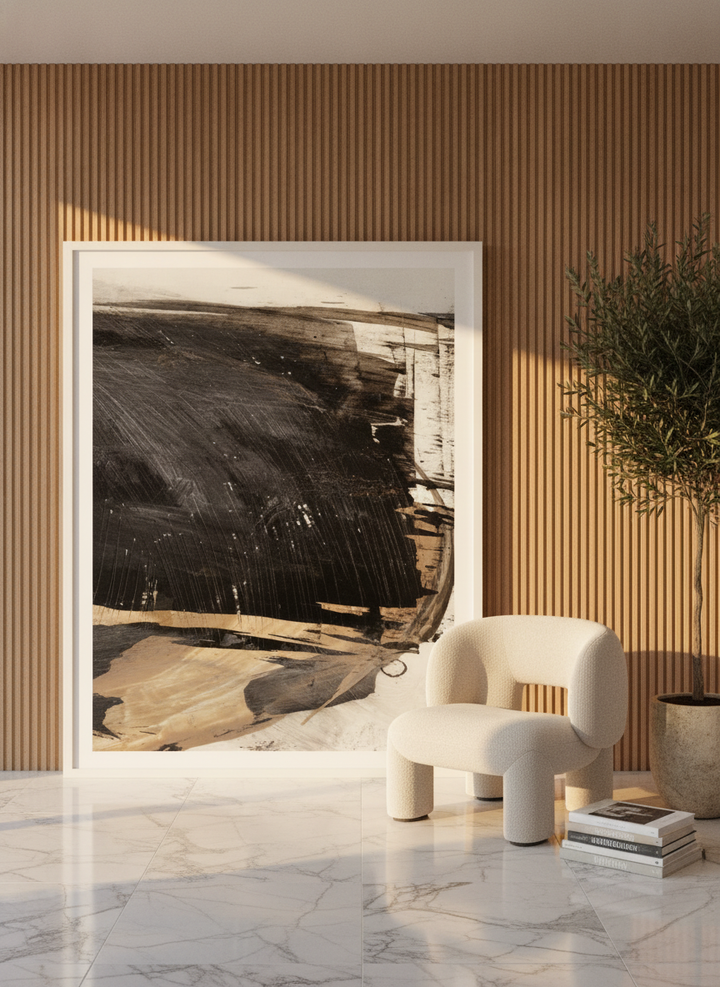 Oversized statement modern wall art print leaning against the wall in a luxe bedroom