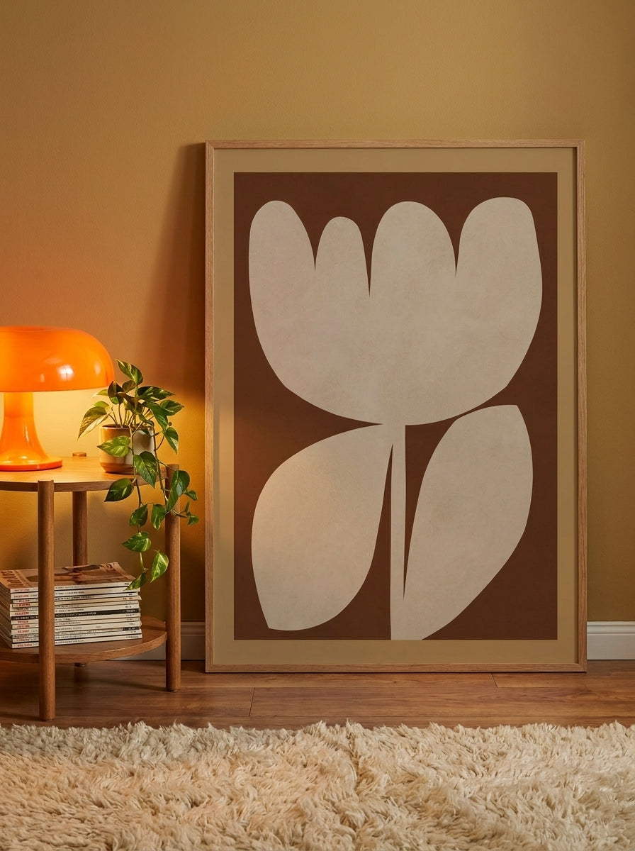 Oversized statement modern wall art print leaning against the wall in a retro 70s dining room