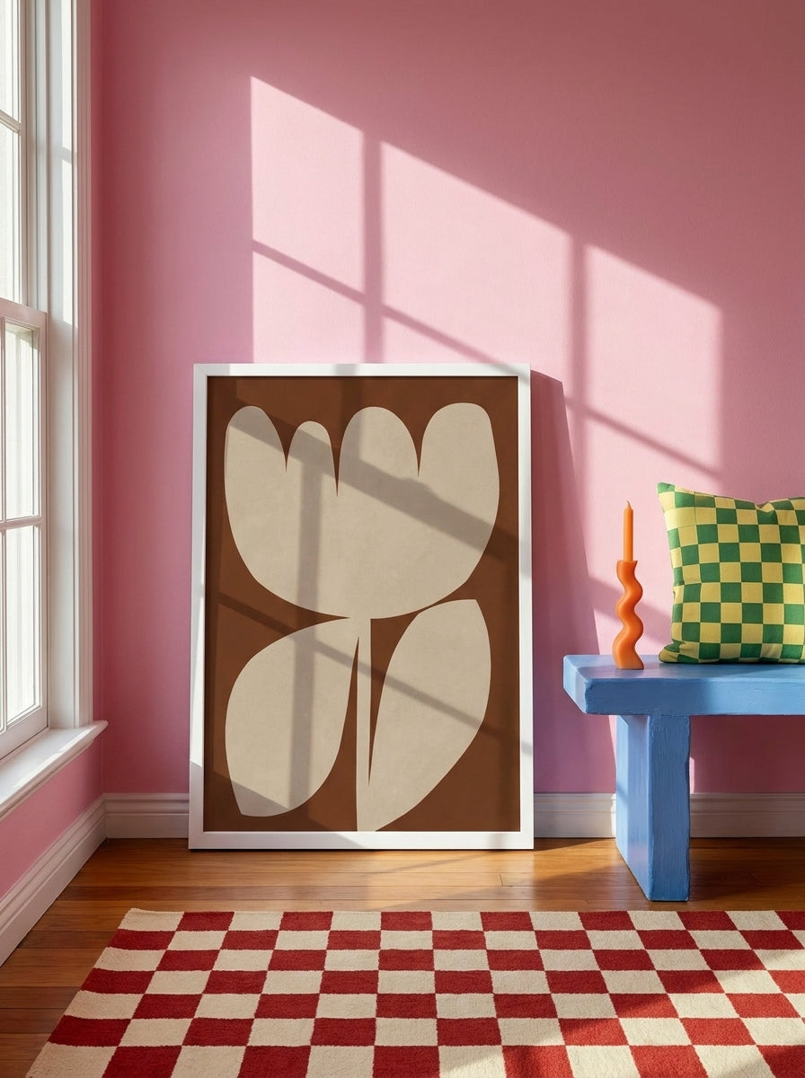 Modern wall art print standing on a side table in a colourful eclectic bedroom