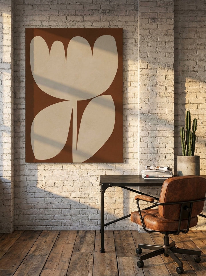 Stretched canvas wall art styled on the wall in an industrial loft home office