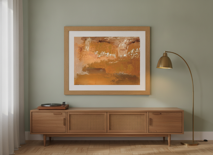 Modern wall art print styled on the wall in a mid-century living room
