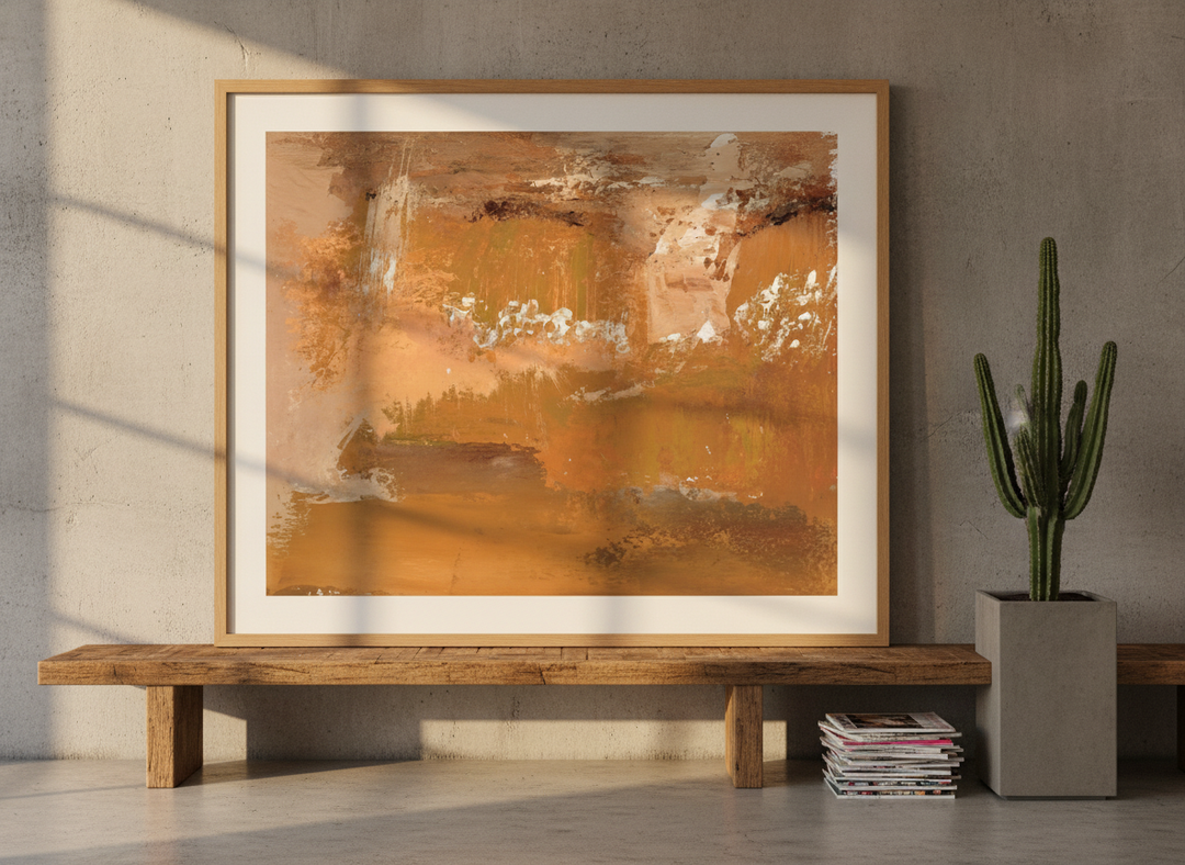 Modern wall art print standing on a bench in an industrial loft bedroom