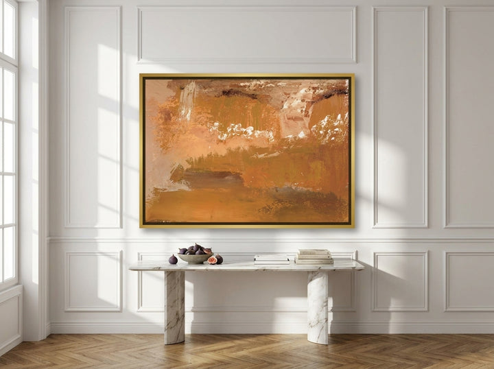 Canvas wall art with a gold leaf surround styled on the wall in a Parisian living room