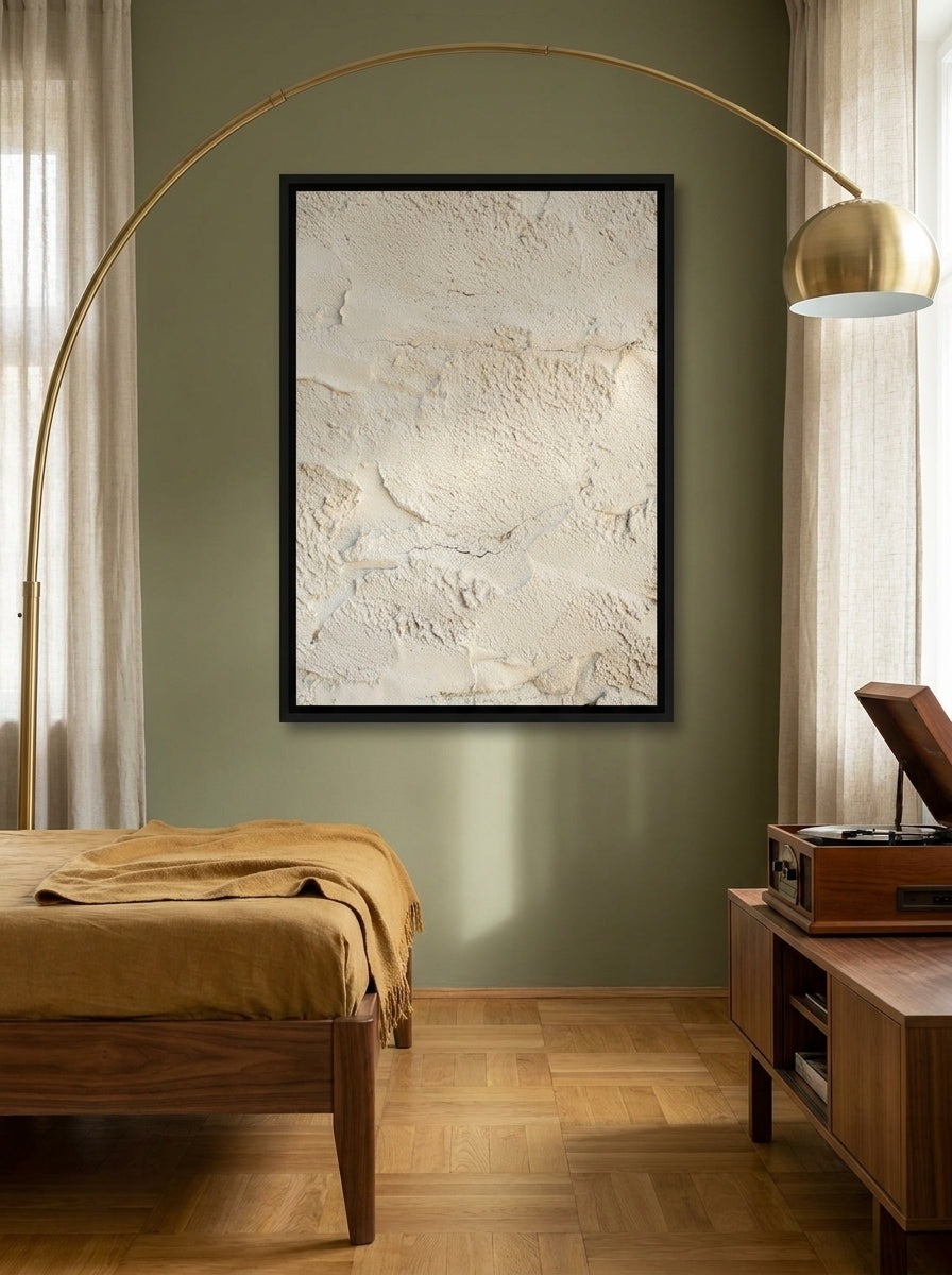 Canvas wall art with a black surround styled on the wall in a mid-century bedroom