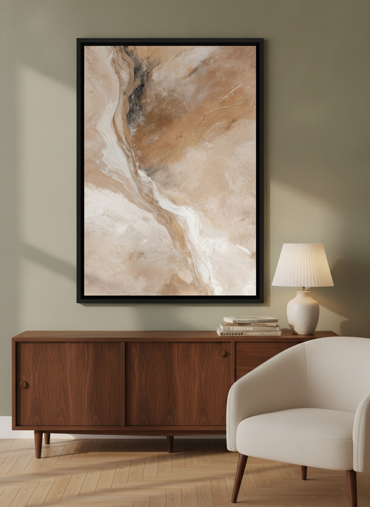 Canvas wall art with a black surround styled on the wall in a mid-century living room