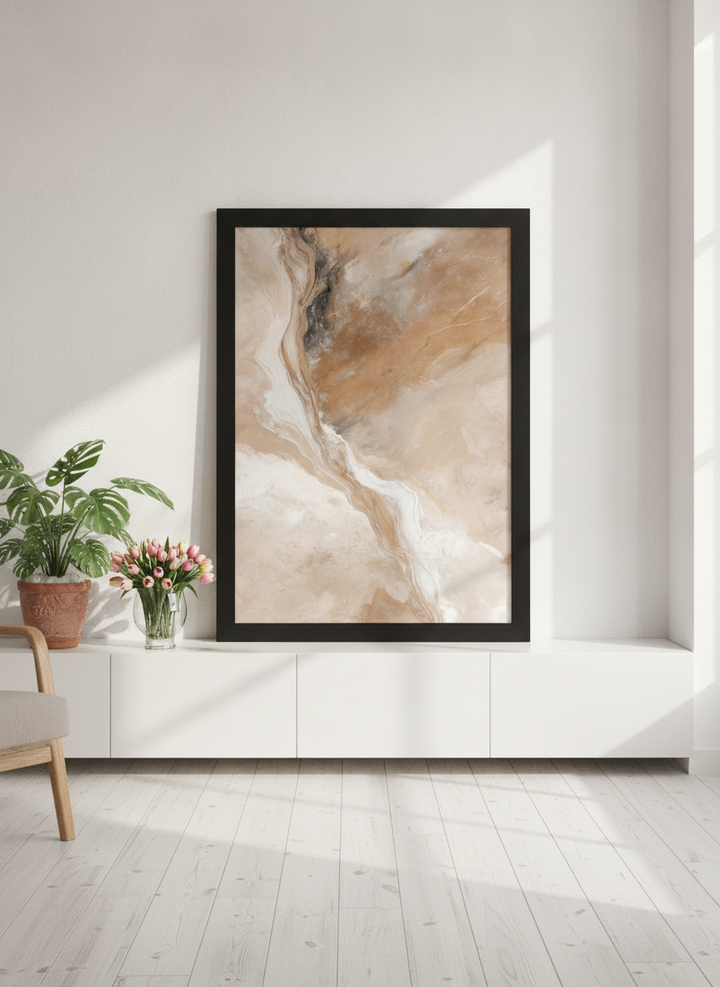 Modern wall art print standing on a sideboard in a bright Scandinavian living room