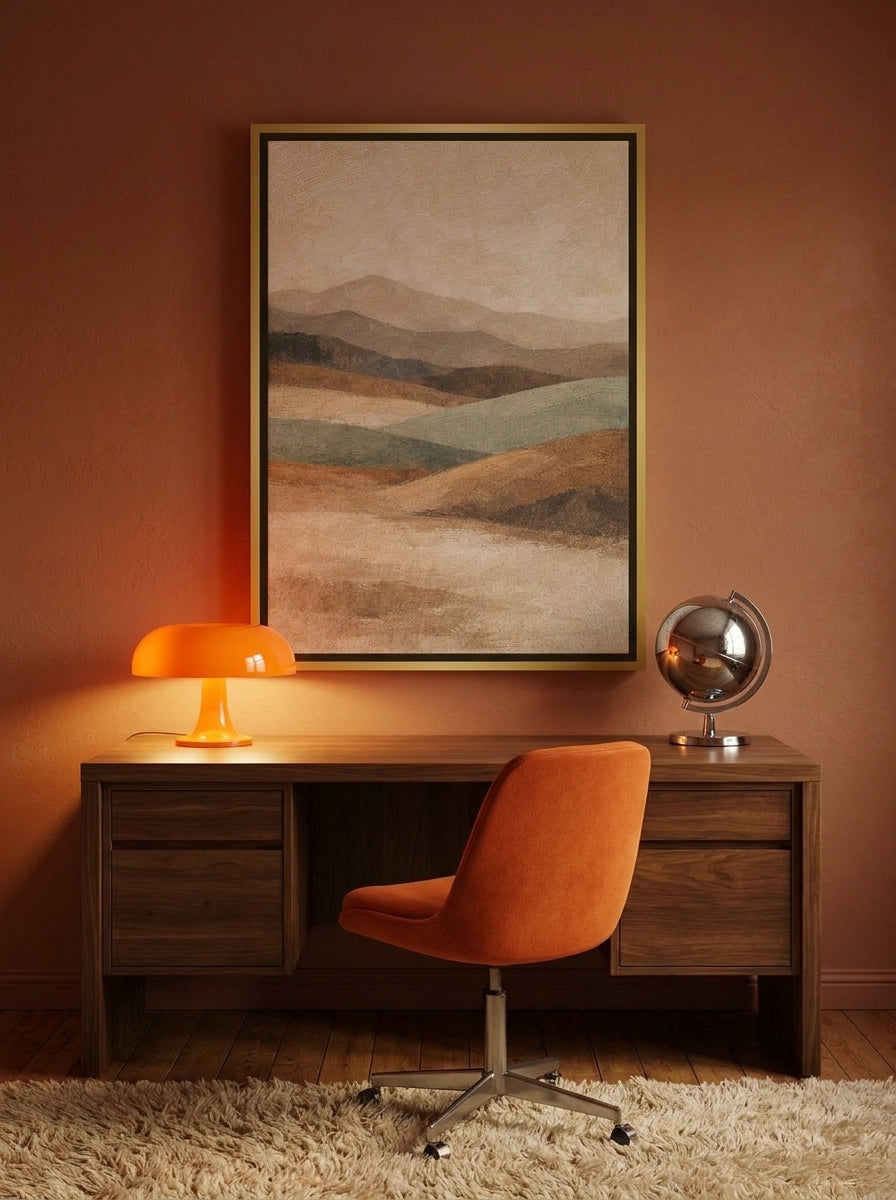 Canvas wall art with a gold leaf surround styled on the wall in a retro 70s home office
