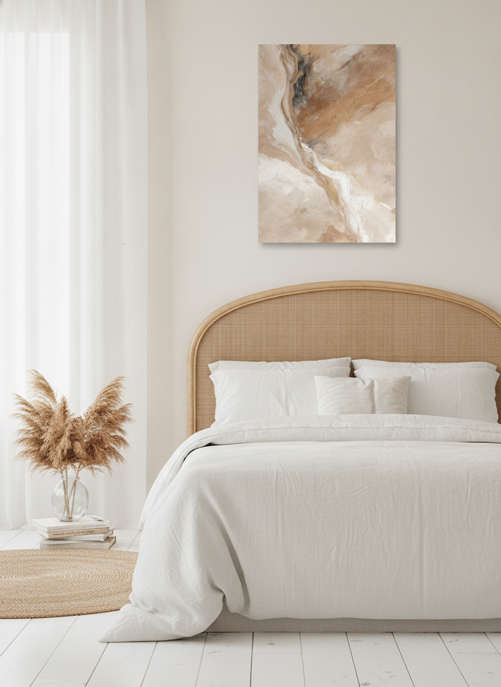 Stretched canvas wall art styled on the wall in a coastal bedroom