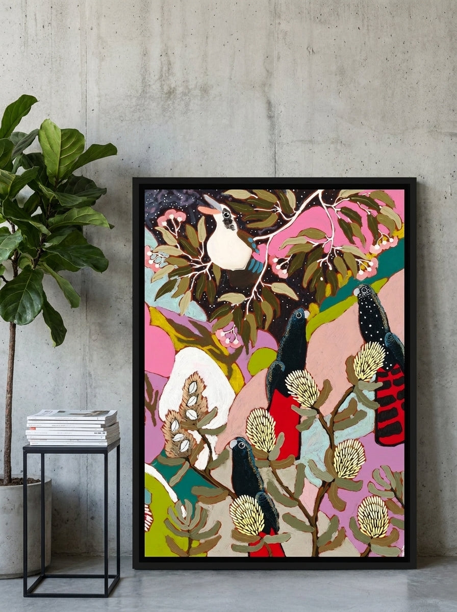 Canvas wall art with a black surround leaning against the wall in an industrial loft living room