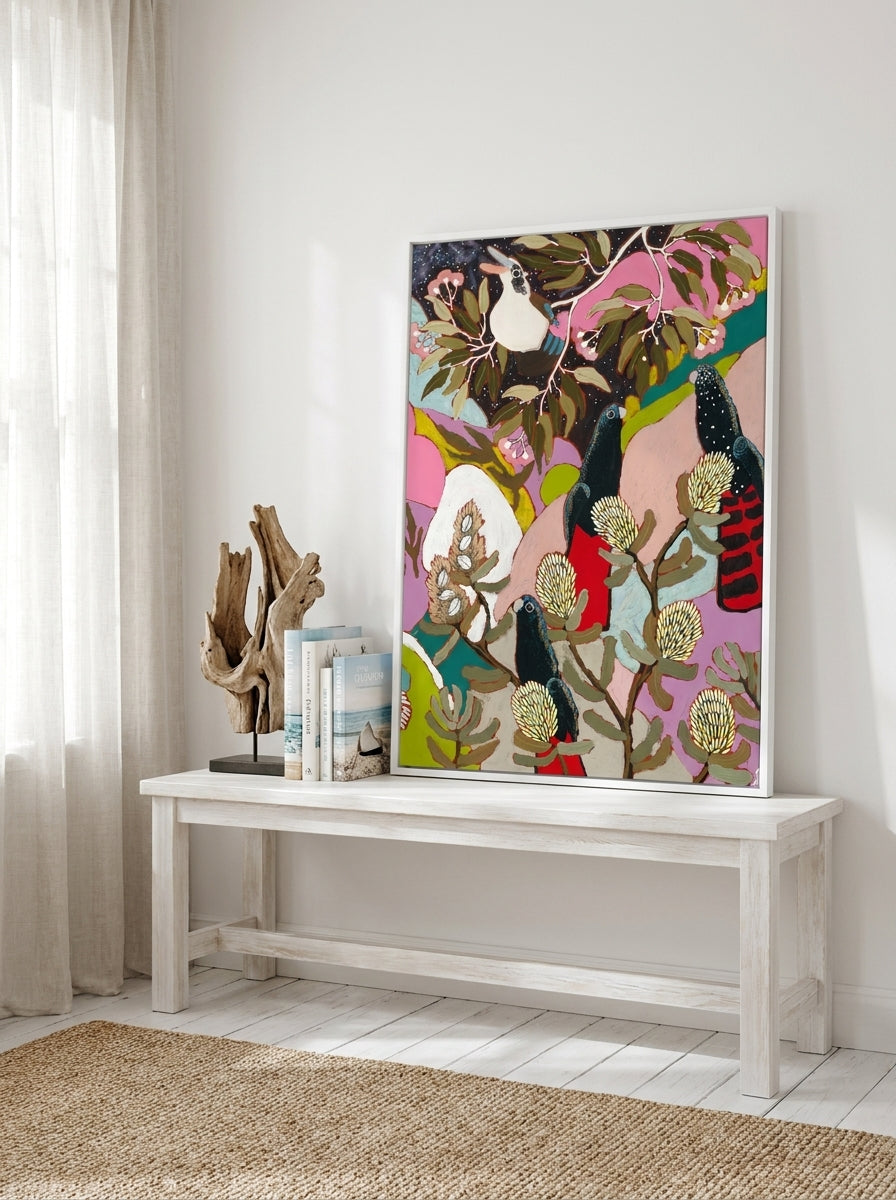 Modern wall art print standing on a console in a coastal bedroom