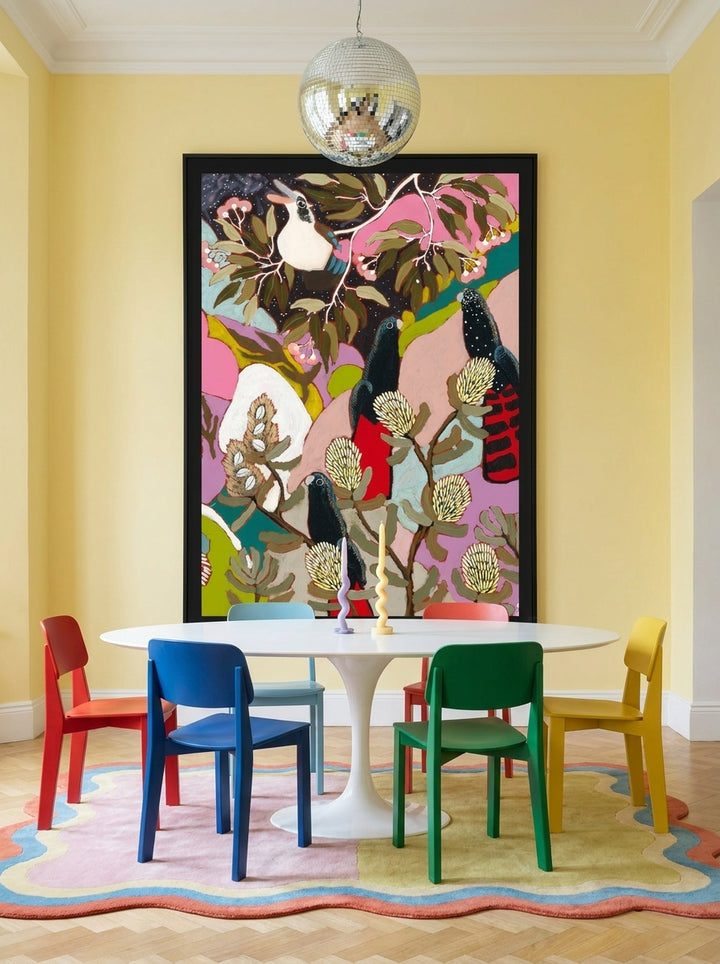 Oversized statement modern wall art print styled on the wall in a colourful eclectic dining room