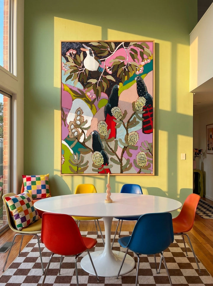 Oversized statement modern wall art print styled on the wall in a colourful eclectic dining room