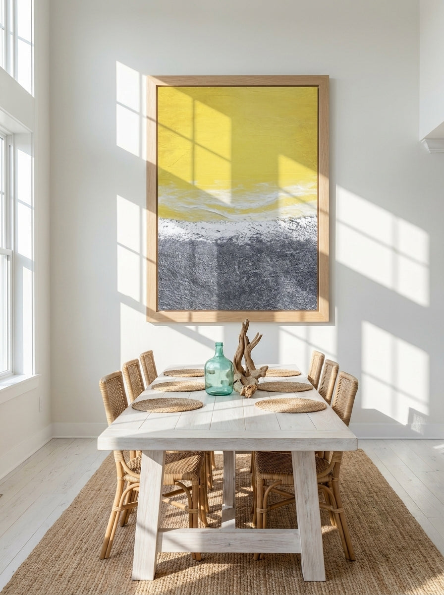 Oversized statement modern wall art print styled on the wall in a coastal dining room
