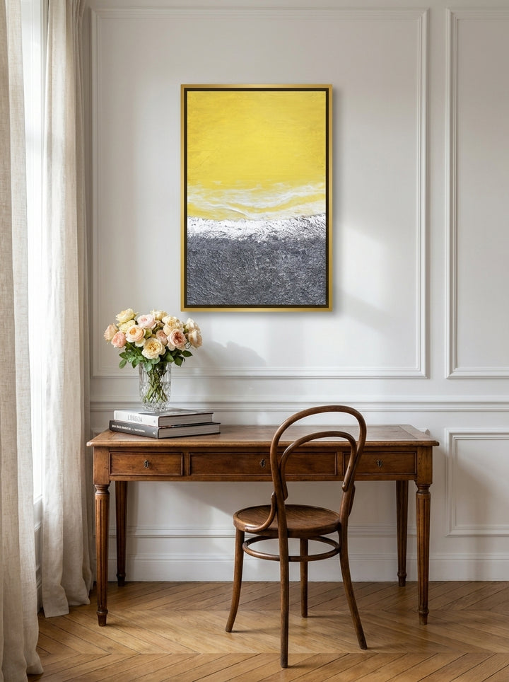 Canvas wall art with a gold leaf surround styled on the wall in a Parisian home office