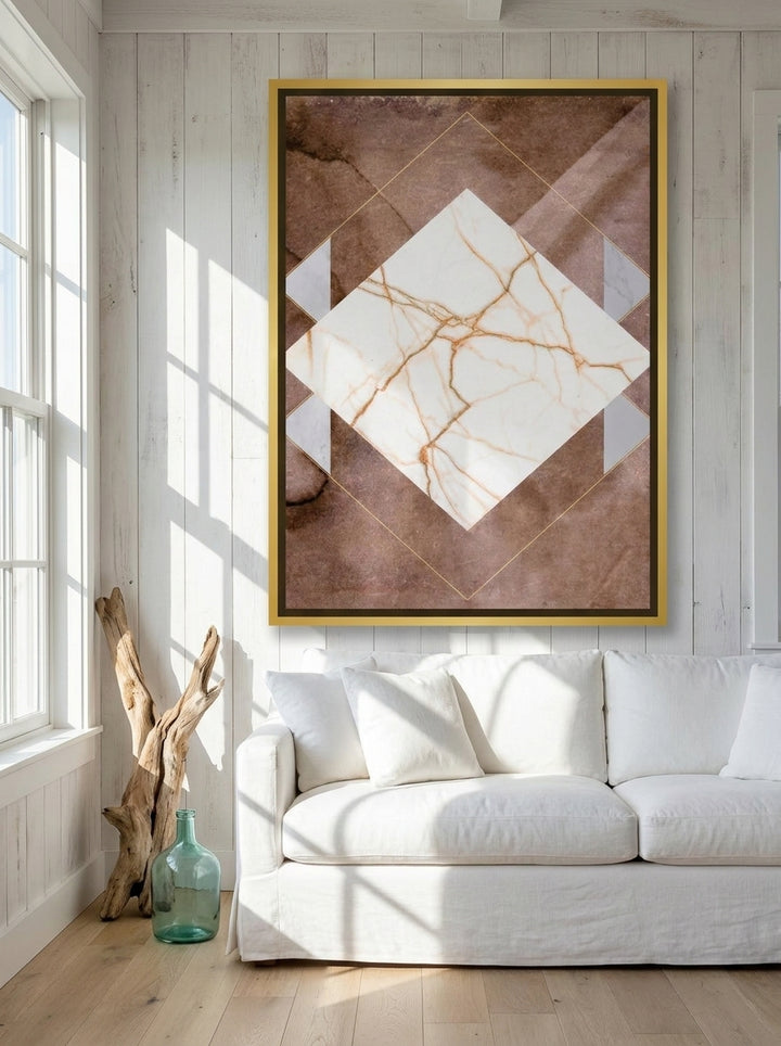 Oversized statement canvas wall art with a gold leaf surround styled on the wall in a coastal living room