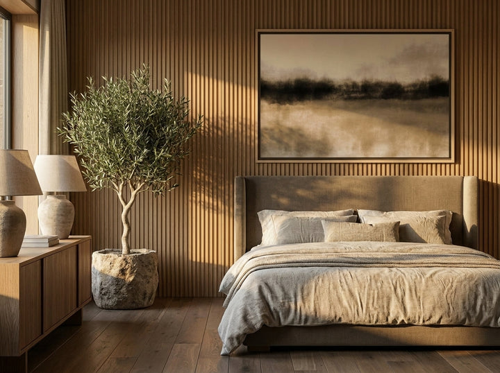 Oversized statement canvas wall art with a natural timber surround styled on the wall in a luxe bedroom