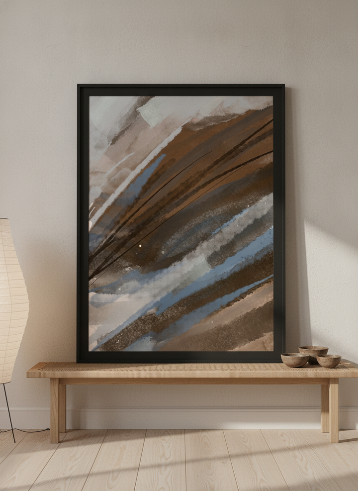 Modern wall art print standing on a bench in a warm Japandi living room