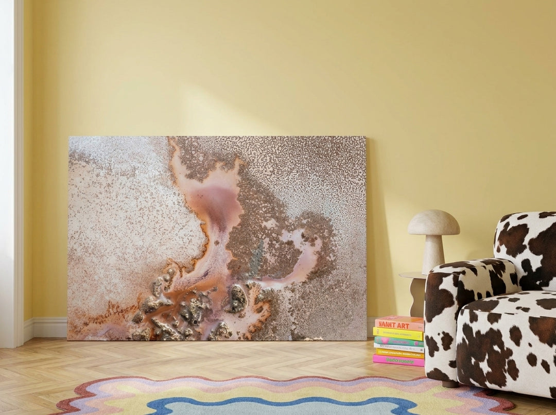 Stretched canvas wall art leaning against the wall in a colourful eclectic bedroom