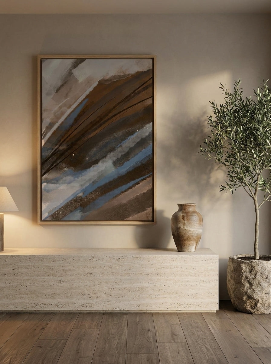Oversized statement canvas wall art with a natural timber surround styled on the wall in a luxe living room