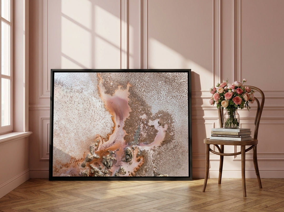 Canvas wall art with a black surround leaning against the wall in a Parisian bathroom