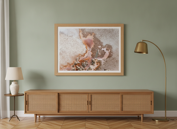 Modern wall art print styled on the wall in a mid-century living room