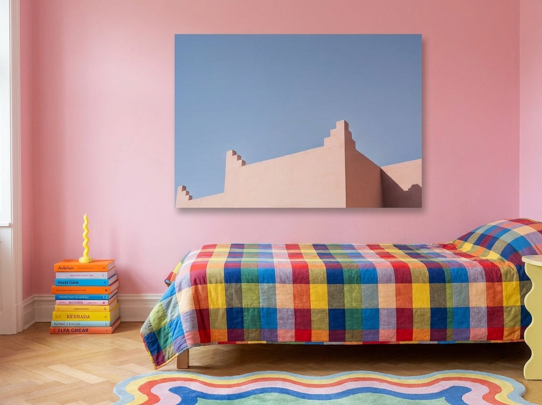 Stretched canvas wall art styled on the wall in a colourful eclectic bedroom
