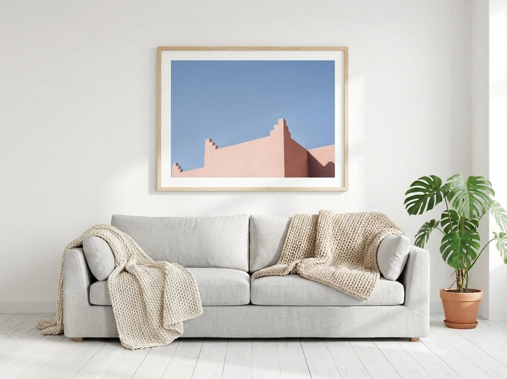 Modern wall art print styled on the wall in a bright Scandinavian living room