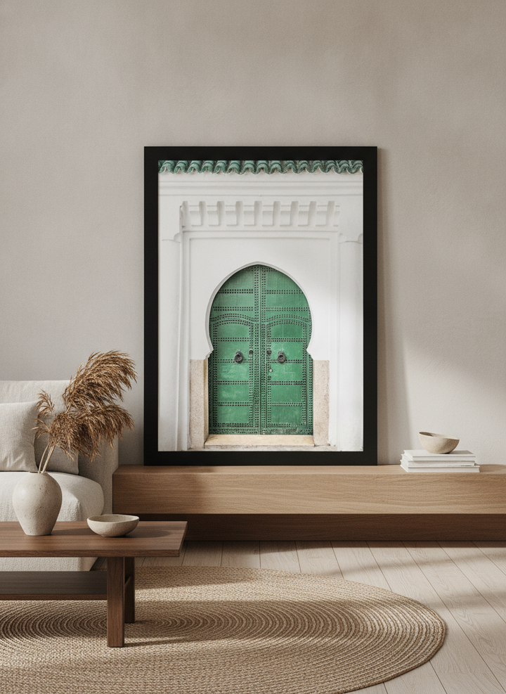 Modern wall art print standing on a shelf in a warm Japandi living room
