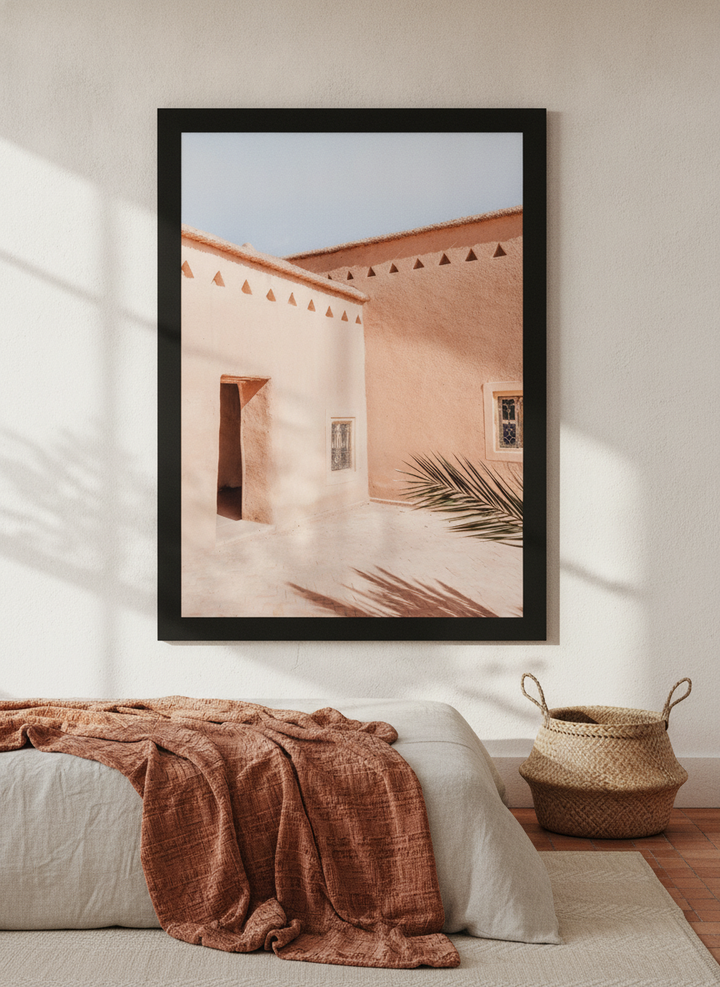 Oversized statement modern wall art print styled on the wall in a Mediterranean bedroom