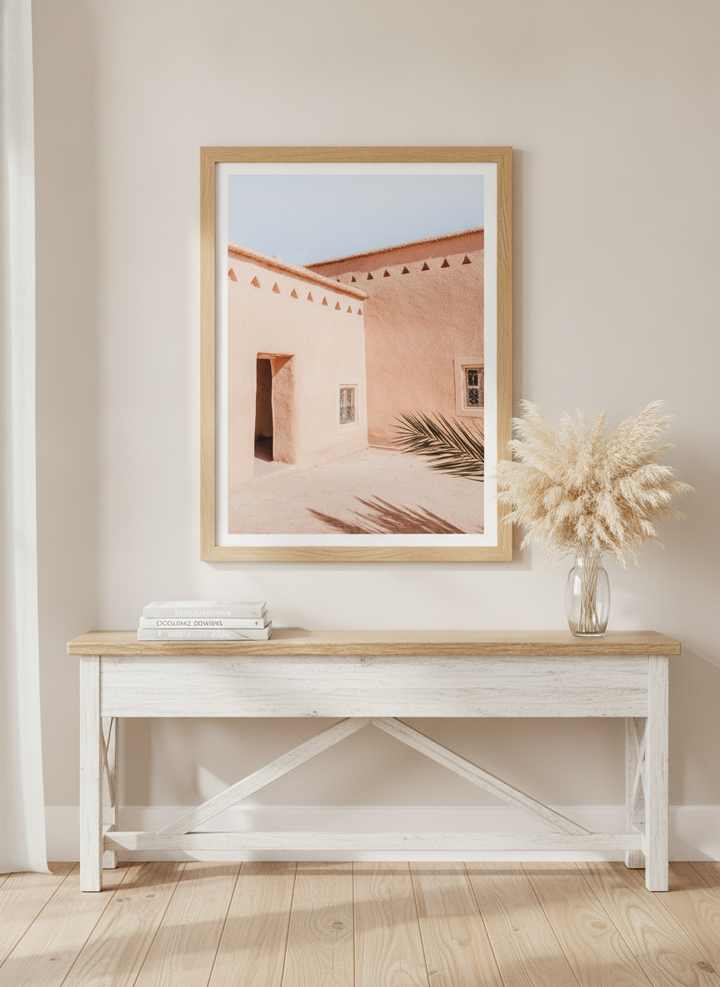 Modern wall art print styled on the wall in a coastal living room