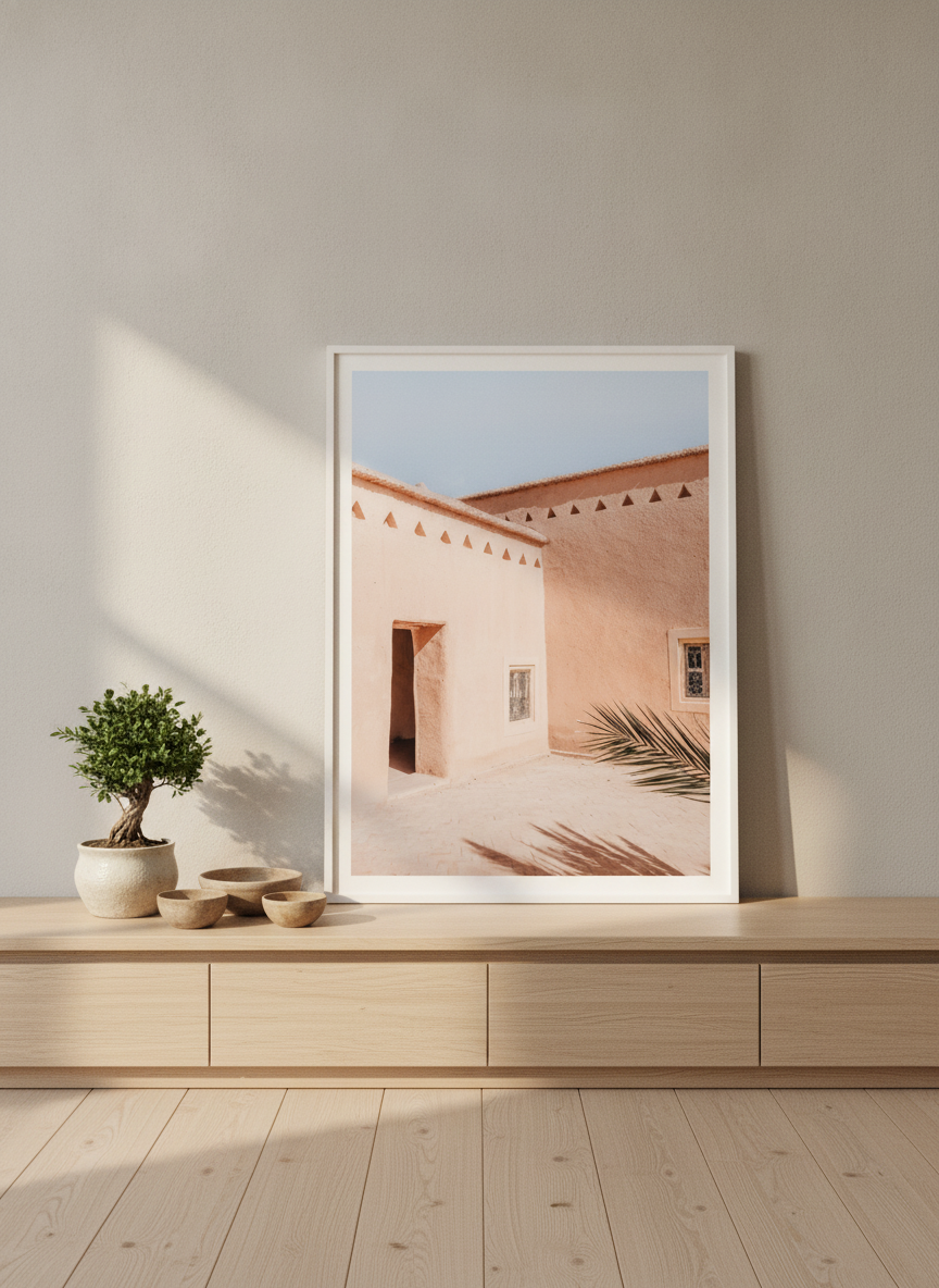 Modern wall art print standing on a sideboard in a warm Japandi home office