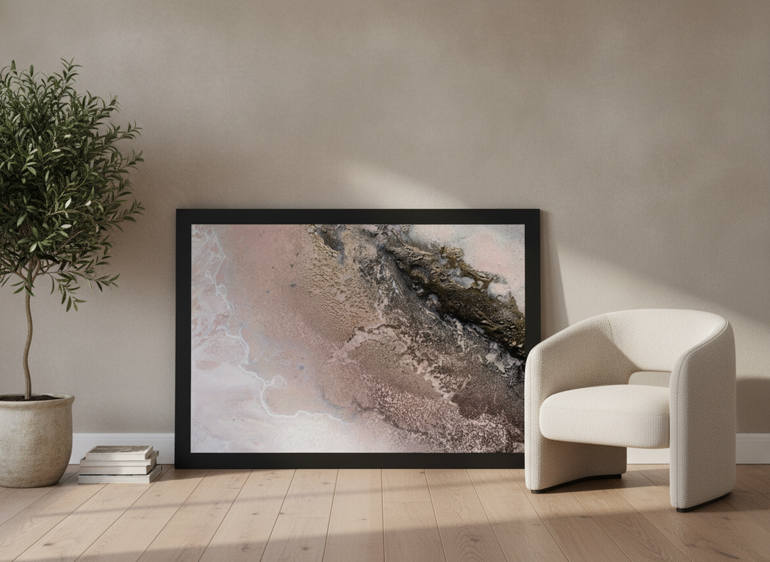 Modern wall art print leaning against the wall in a luxe home office