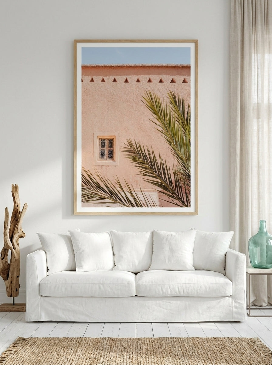 Modern wall art print styled on the wall in a coastal living room