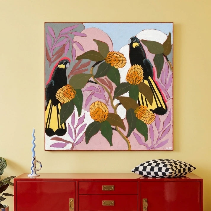 Stretched canvas wall art styled on the wall in a colourful eclectic living room
