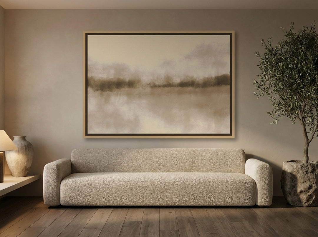 Oversized statement canvas wall art with a natural timber surround styled on the wall in a luxe living room