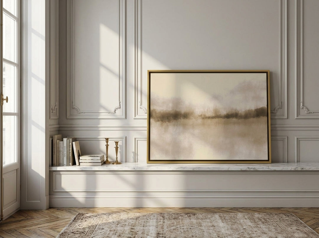 Canvas wall art with a gold leaf surround standing on a console in a Parisian home office