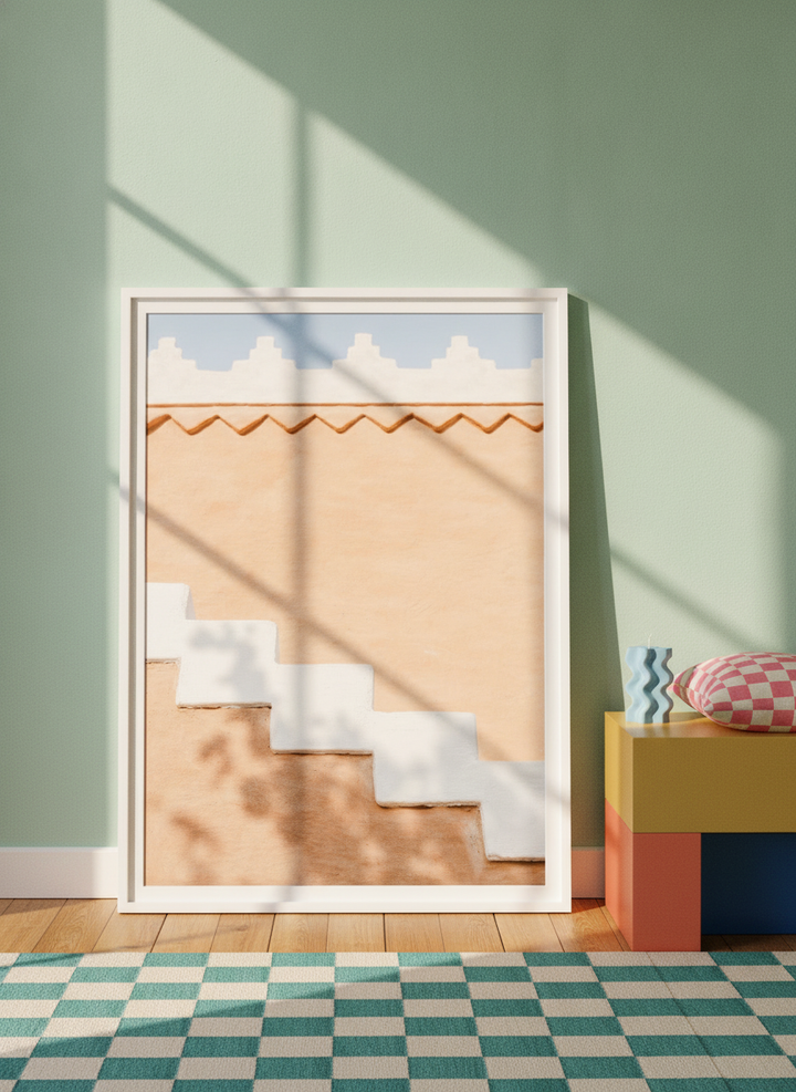 Modern wall art print leaning against the wall in a colourful eclectic bedroom