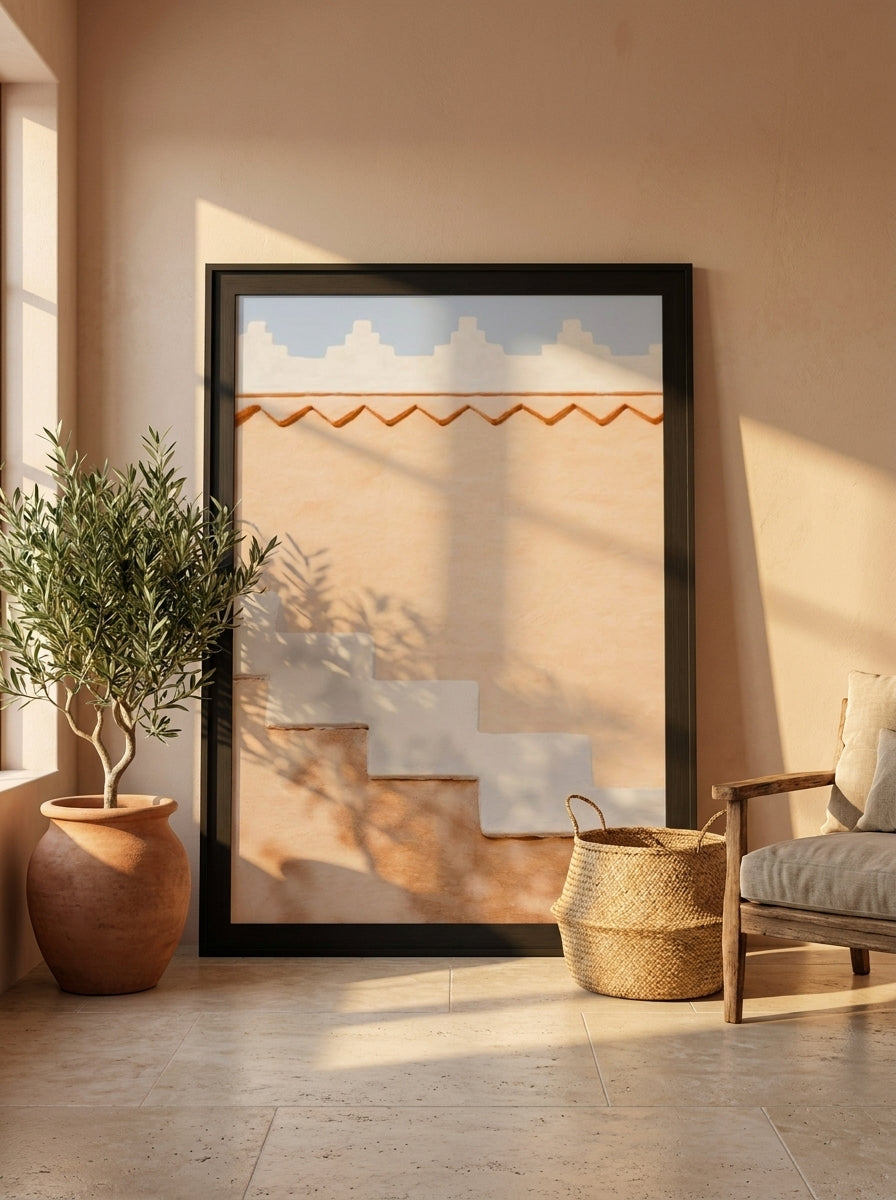 Oversized statement modern wall art print leaning against the wall in a Mediterranean bedroom