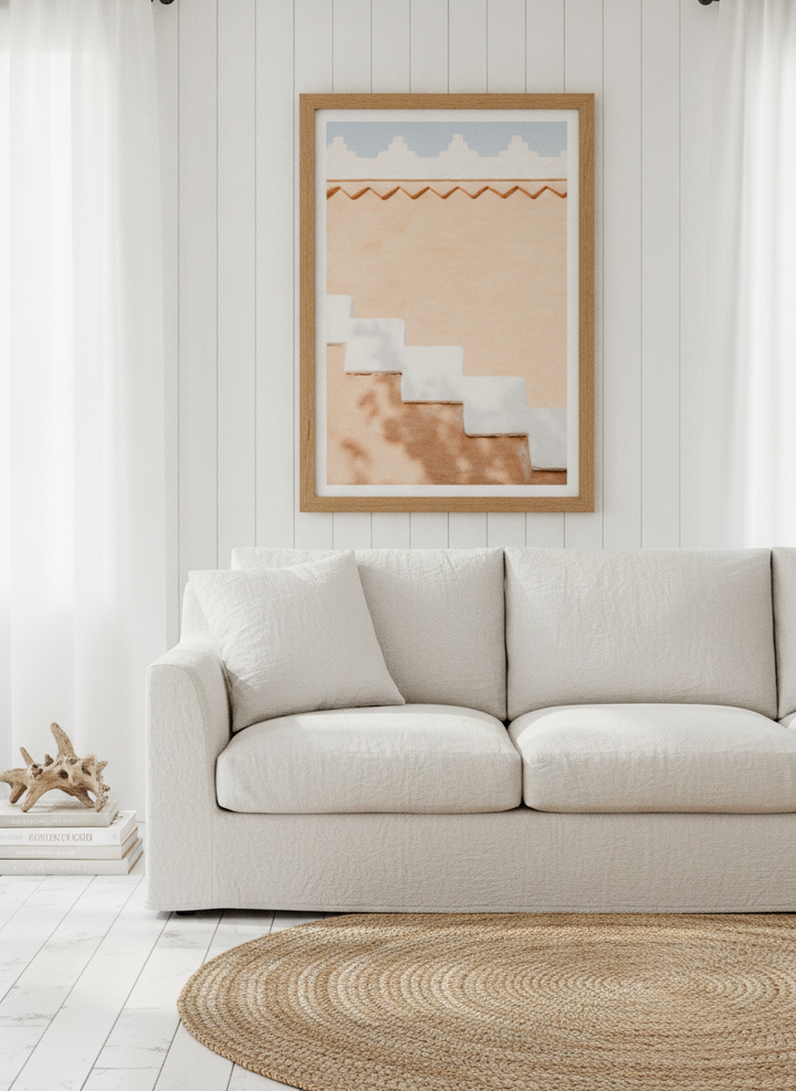 Modern wall art print styled on the wall in a coastal living room