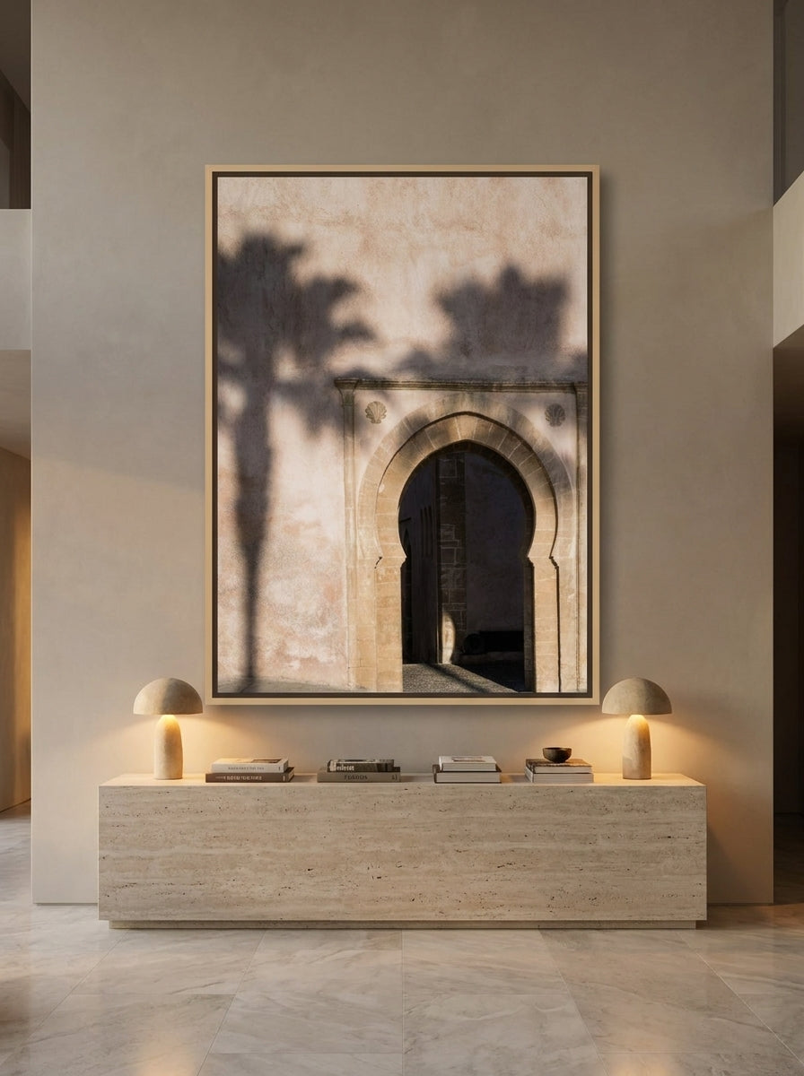 Oversized statement canvas wall art with a natural timber surround styled on the wall in a luxe living room